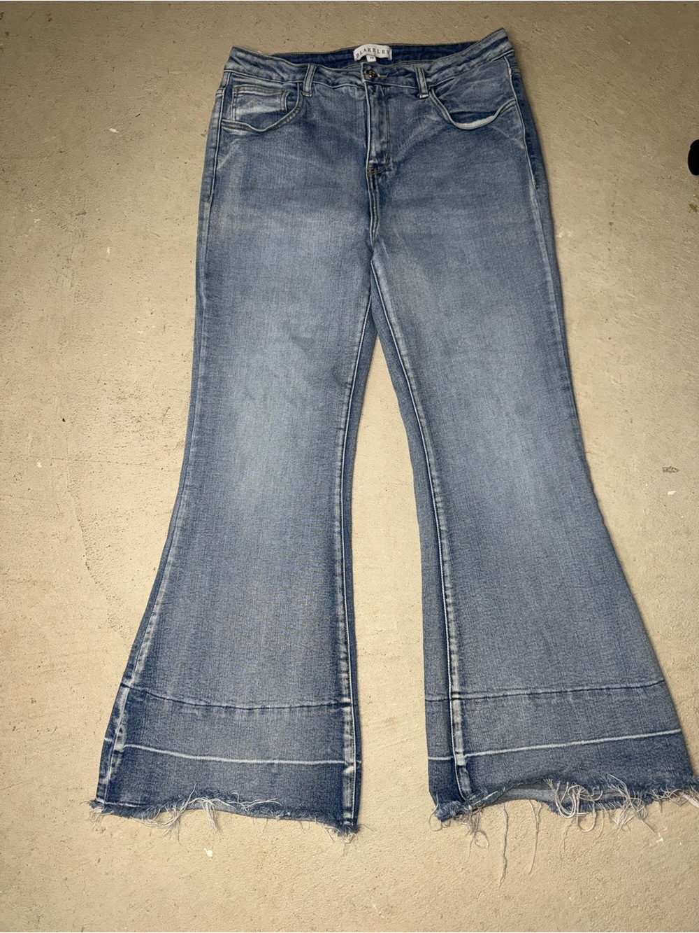 BLAKELEY Wide-Leg Flare Jeans in Medium Blue with Raw Hem
